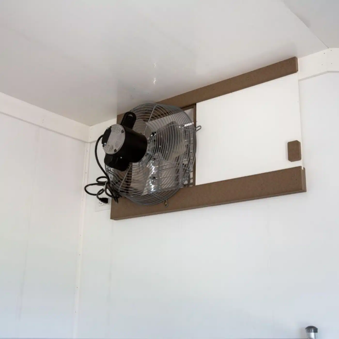 Bird in Hand Electric Exhaust Fan With Shutters